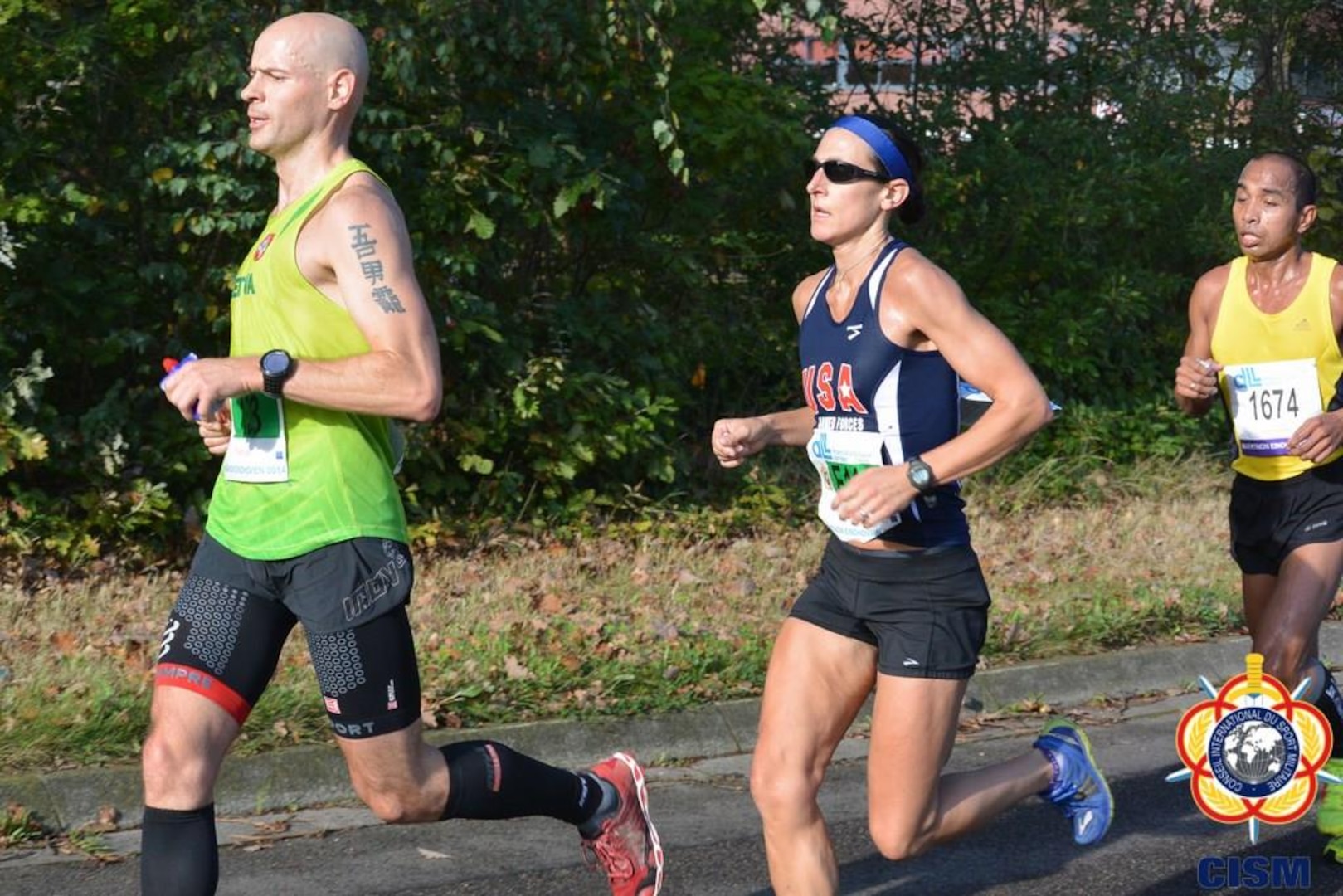 Navy LT Gina Slaby leads the US Women and placing 4th overall in the CISM Women's Division.  Slaby finished with a time of 2:43:57 during the 46th CISM Marathon World Military Championship 9-14 October 2014 in Eindhoven, Netherlands.