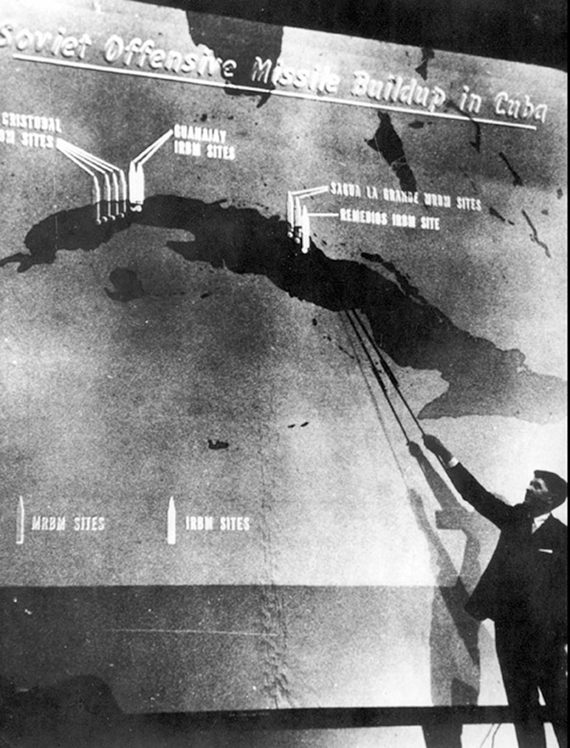 Using overhead reconnaissance photography, DIA’s John Hughes, special assistant to DIA Director Lt. Gen. Joseph Carroll, conducts a televised briefing on the removal of soviet missiles from Cuba, Feb. 6, 1963. Secretary of Defense Robert McNamara asked Hughes to give the briefing in order to quell rumors that the soviets still had nuclear missiles in Cuba. 