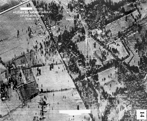 This photo was the first one identified by photo interpreters at the National Photographic Interpretation Center as revealing the presence of Soviet medium-range ballistic missiles in Cuba. It was taken Oct. 14, 1962, by a U-2 flight ordered by President John Kennedy because DIA analysts believed that Soviet nuclear missiles might be in Cuba. Missile trailers are visible on the bottom right. 