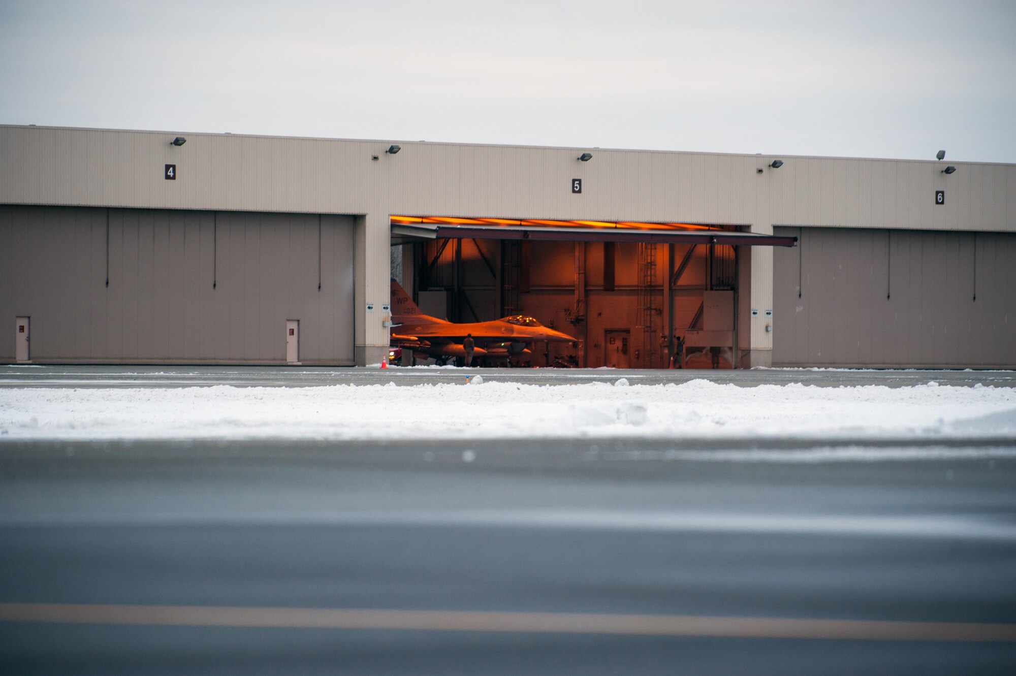 An F-16 Fighting Falcon from Kunsan Air Base, Republic of Korea, prepares to taxi to the runway during RED FLAG-Alaska 15-1 at Eielson Air Force Base, Alaska, Oct. 9, 2014. RF-A provides training for deployed maintenance and support personnel in sustainment of large-force deployed air operations and is a Pacific Air Forces-directed field training exercise for U.S. and international forces flown under simulated air combat conditions. (U.S. Air Force Photo by Senior Airman Taylor Curry/Released)
