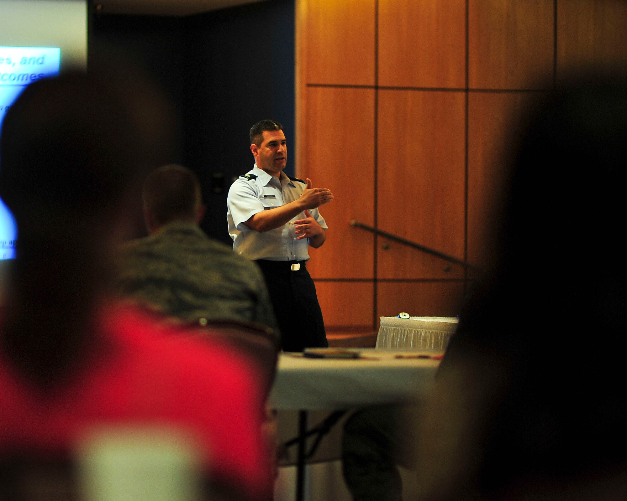 Maj. Gregg A. Quinones, partnership broker assigned to the Secretary of the Air Force for Installations, Environment and Logistics, speaks to attendees of P4, Public-Public; Public-Private Partnership, about new potential partnerships Oct. 9. While partnerships have existed between the surrounding communities, businesses and Tyndall in the past, this program is a way to resolve the most challenging issues with the oversight and staff support of Headquarters Air Force.  (U.S. Air Force photo by Airman 1st Class Dustin Mullen)