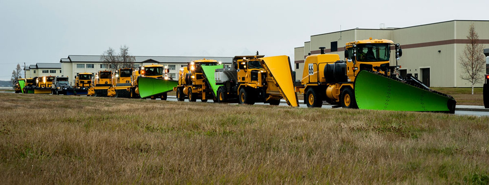 Snow-removal vehicles travel in a queue during JBER’s Snow Parade Oct. 10. (U.S. Air Force photo/Airman 1st Class Tammie Ramsouer)

