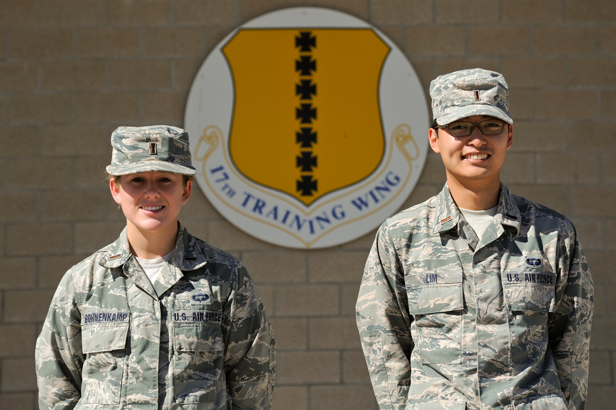GOODFELLOW AIR FORCE BASE, Texas – 2nd Lts. Emily M. Bohnenkamp and Andrew Lim, 315th Training Squadron Students, pose for a photo in front of the Norma Brown Building Oct. 15. Lim and Bohnenkamp rescued an 8-month-old baby girl from a vehicle accident Oct. 9. (U.S. Air Force photo/ Airman 1st Class Devin Boyer)