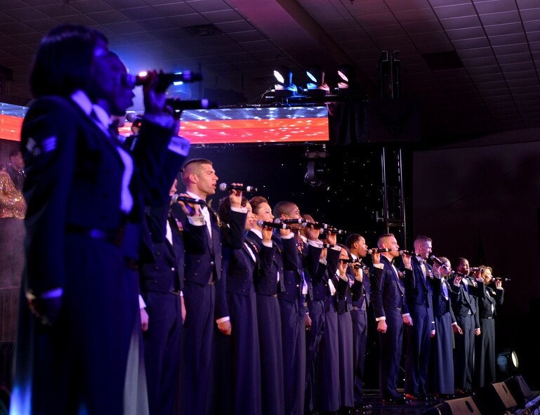 Air Force Tops in Blue performs their final song for the Barksdale community during the 2014 World Tour, on Barksdale Air Force Base, La., Oct. 16, 2014. Tops in Blue is an active-duty unit consisting of the most talented vocalists, musicians, dancers and technicians in the Air Force. (U.S. Air Force Photo/Airman 1st Class Mozer O. Da Cunha)