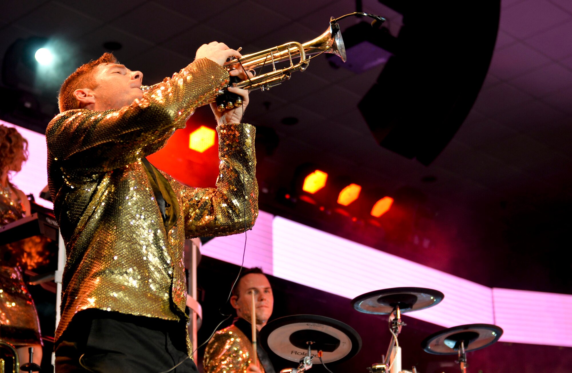 Staff Sgt. Andrew Bowman, plays the trumpet during the 2014 World Tour on Barksdale Air Force Base, La., Oct. 16, 2014. Tops in Blue is an active-duty unit consisting of the most talented vocalists, musicians, dancers and technicians in the Air Force. (U.S. Air Force Photo/Airman 1st Class Mozer O. Da Cunha)