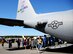 Visitors to the Wing over North Georgia air show line up to tour the bay area of a U.S. Air Force C-130 Hercules from Dobbins Air Reserve Base, Ga. at Rome, Ga., Oct. 18, 2014. The 700th Airlift Squadron brought a U.S. Air Force C-130 Hercules to the WONG air show as a static display. (U.S. Air Force photo by Senior Airman Daniel Phelps/Released)