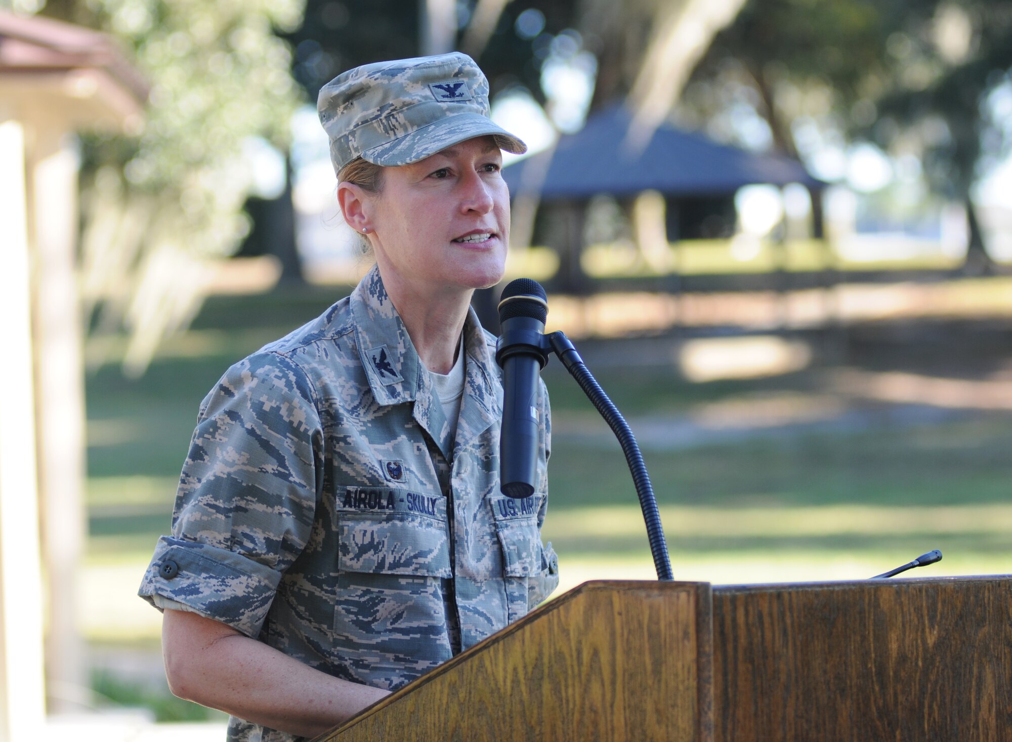 Col. Susan Airola-Skully, 81st Mission Support Group commander, delivers remarks during the opening of the Nature Explore Accessible Park at the marina park Oct. 16, 2014, at Keesler Air Force Base, Miss.  The new park is an area of nature-based learning and creative play for children with developmental and physical challenges, ages 12 and younger. The event also included the release of butterflies, ladybugs and flower planting. (U.S. Air Force photo by Kemberly Groue)