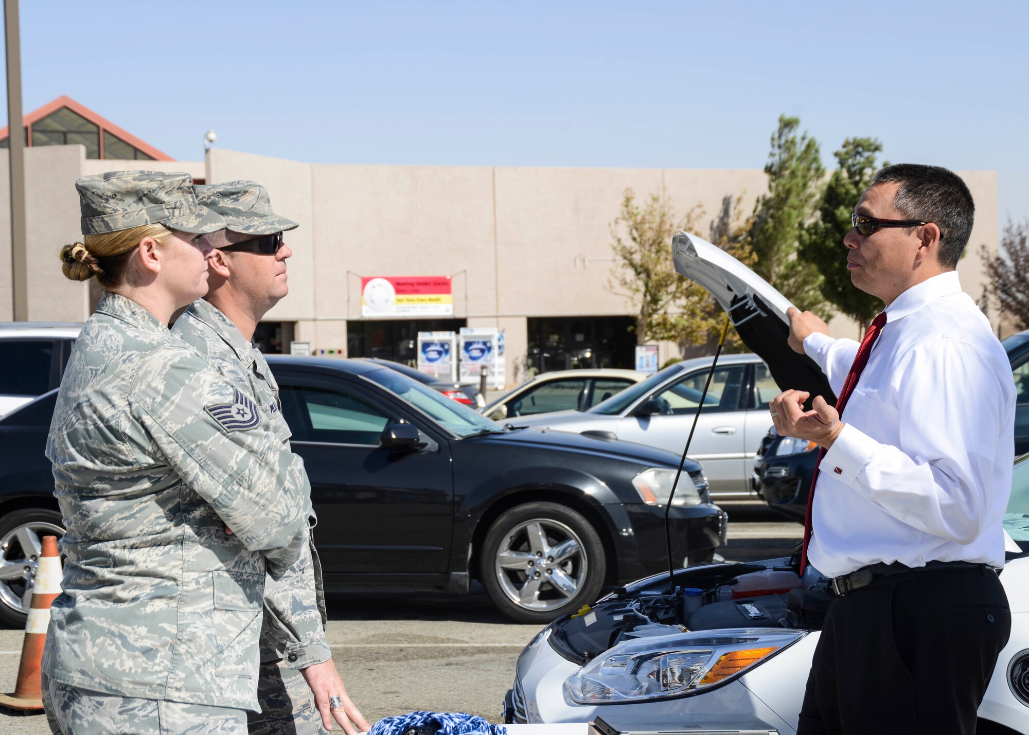 Antelope Valley Hispanic Chamber of Commerce vice president Terry Norris volunteered to join the event and show his entirely electric 2014 Ford Focus. (U.S. Air Force photo by Rebecca Amber)