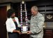 U.S. Air Force Col. Marshall C. Collins, commander, 145th Airlift Wing and retired Lt. Col. Rose Dunlap, representative for the Combined Federal Campaign (CFC), proudly display the 2013 Greater North Carolina CFC American Eagle “Top Perch” award. Collins accepted on behave of all military members and federal employees of the North Carolina Air National Guard that so generously contributed to local, national and international charities. The presentation was held at the North Carolina Air National Guard base, Charlotte Douglas Intl. Airport, June 17, 2014. (U.S. Air National Guard photo by Master Sgt. Patricia F. Moran, 145th Public Affairs/Released)