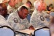 U.S. Air Force Master Sgt. Bradley Tabron, 145th Logistics Readiness Squadron, Vehicle Operations Supervisor, looks through a list of charities during a meeting kicking off the 2014 Combined Federal Campaign (CFC) fundraiser at the North Carolina Air National Guard base, Charlotte Douglas Intl. Airport, Oct 10, 2014. CFC is the world’s largest and most successful annual workplace charity campaign.  Pledges made and donated by Federal employees and military members provide health and human service benefits throughout our neighborhoods, cities, country and world. (U.S. Air Force photo by Master Sgt. Patricia F. Moran, 145th Public Affairs/Released)