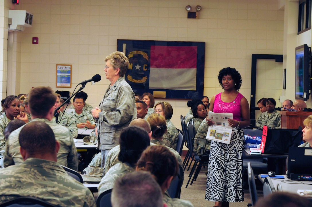 U.S. Air Force Lt. Col. Debra Kidd, chaplain for the 145th Airlift Wing, talks with military and Federal employees as the 2014 Combined Federal Campaign (CFC) fundraiser kicks off at the North Carolina Air National Guard base, Charlotte Douglas Intl. Airport, Oct 10, 2014. Chaplain Kidd, along with retired Lt. Col. Rose Dunlap, Loan Executive for Central Carolina CFC, thanks the many donators as they continue to support local, national and international charities through CFC. (U.S. Air National Guard photo by Master Sgt. Patricia F. Moran, 145th Public Affairs/Released)
