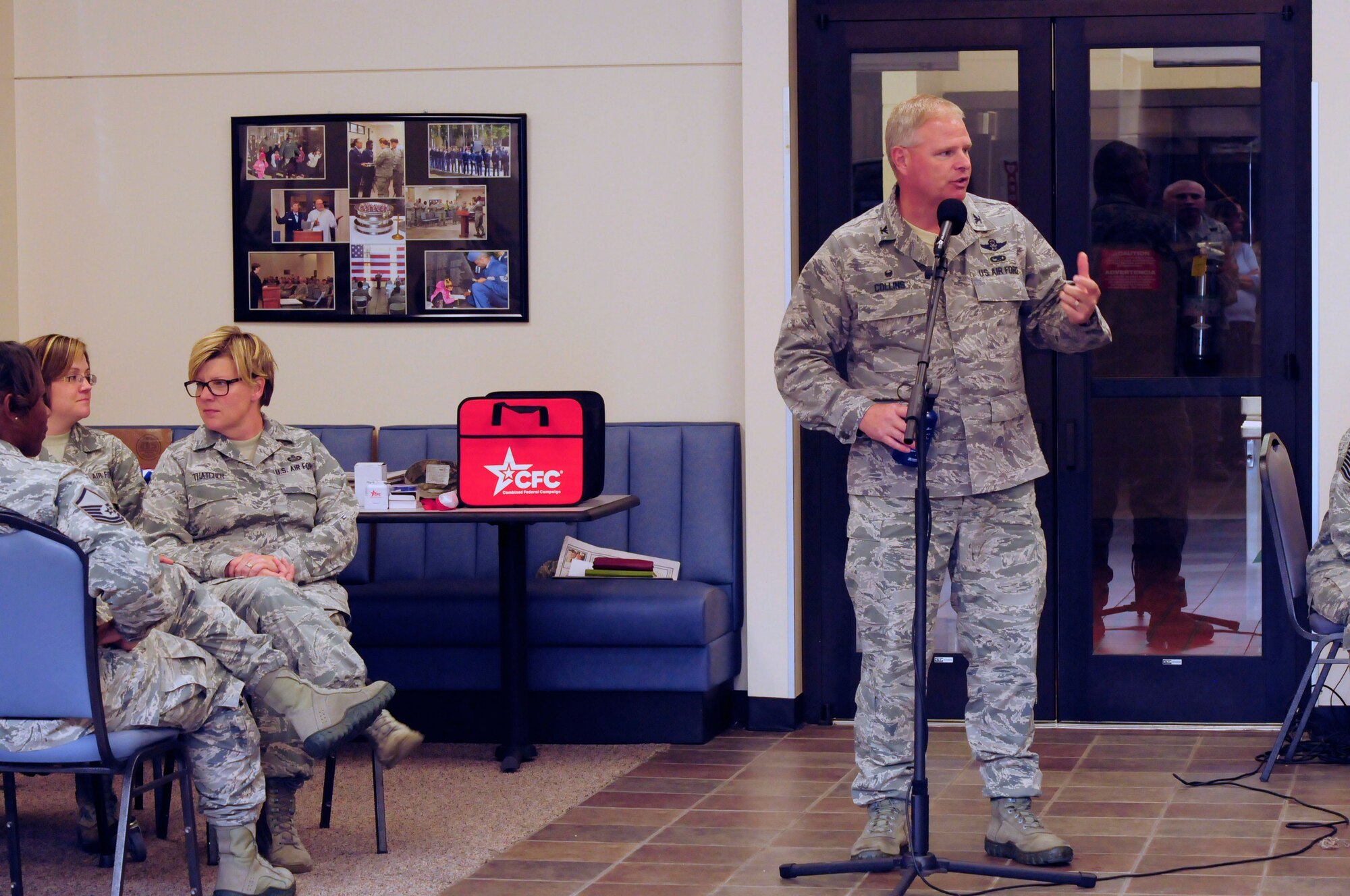 U.S. Air Force Col. Marshall C. Collins, commander North Carolina Air National Guard, 145th Airlift Wing, holds a meeting for full-time military and federal employees kicking off the 2014   Combined Federal Campaign (CFC) fundraiser at the North Carolina Air National Guard base, Charlotte Douglas Intl. Airport, Oct 10, 2014. Pledges made and donated by Federal employees and military members provide health and human service benefits throughout our neighborhoods, cities, country and world. (U.S. Air National Guard photo by Master Sgt. Patricia F. Moran, 145th Public Affairs/Released)