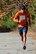Senior Master Sgt. Michael R. Mercier, 157th Maintenance Squadron budget analyst, runs a leg during the 6th Annual Pease Relay Race in Newington, N.H. Oct. 19. More than 100 runners competed on 13 teams that ran through Newington before finishing at Mission’s End for a post-race awards celebration. (N.H. AIr National Guard photo by Tech. Sgt. Mark Wyatt)