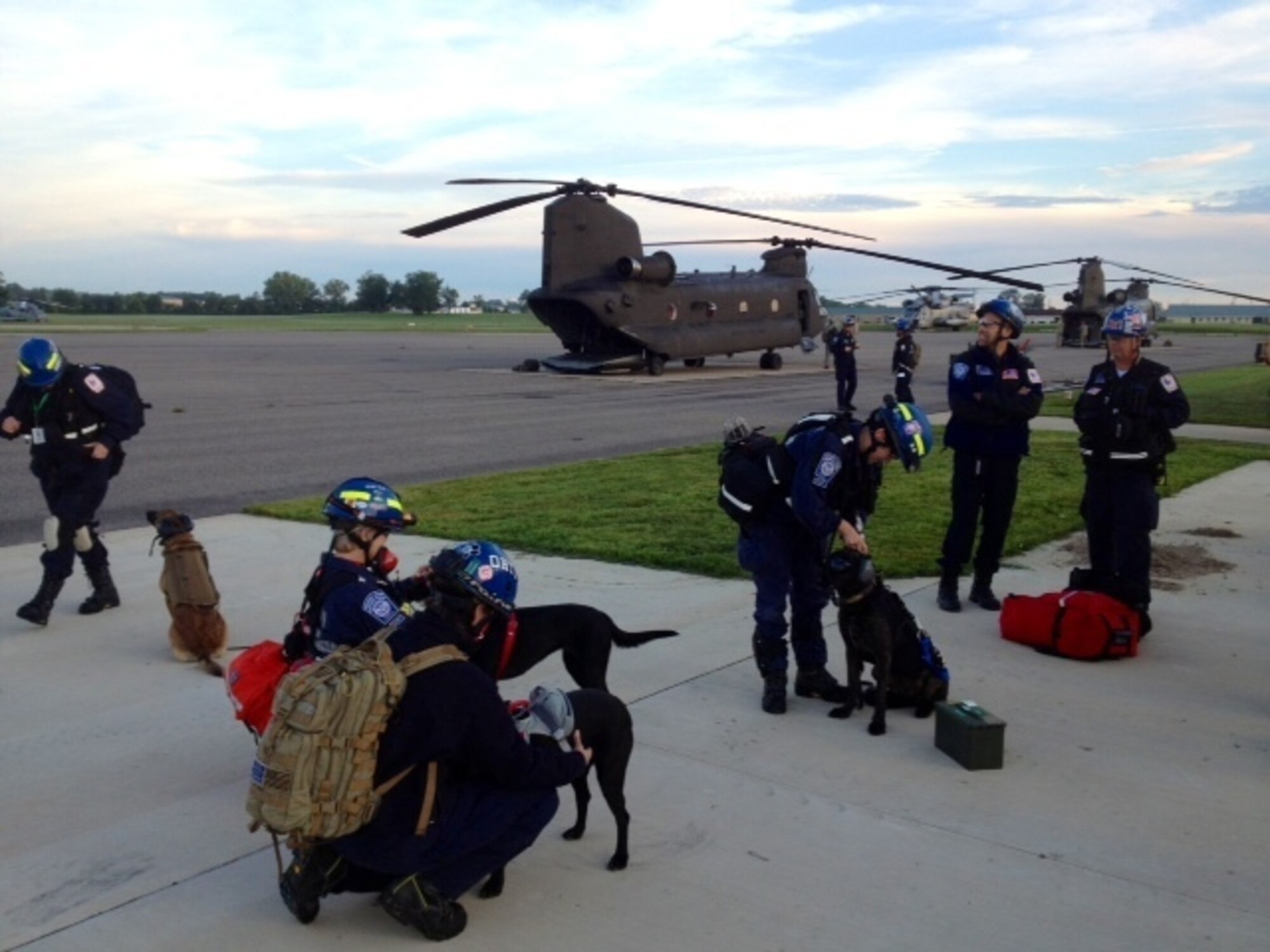 Army Reserve CH-47 Chinooks and Soldiers from the 244th Aviation Brigade stand ready to insert a Federal Emergency Management Agency search and rescue team during Exercise Vibrant Response 2013. (U.S. Army photo by Sgt. Christopher Sofia/Released)