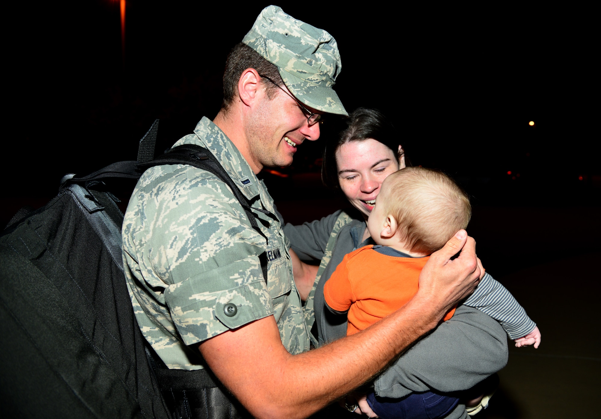 U.S. Air Force 1st Lt. Joseph Broeckelmann, 633rd Medical Operations Squadron emergency room nurse, greets his family during a homecoming ceremony at Langley Air Force Base, Va., Oct. 20, 2014. The 633rd MDG took part in a comprehensive U.S. effort to work with the World Health Organization, and other international partners, to help the governments of Guinea, Liberia and Sierra Leone respond and contain the outbreak of the Ebola virus in West Africa. (U.S. Air Force photo by Senior Airman Aubrey White/Released)