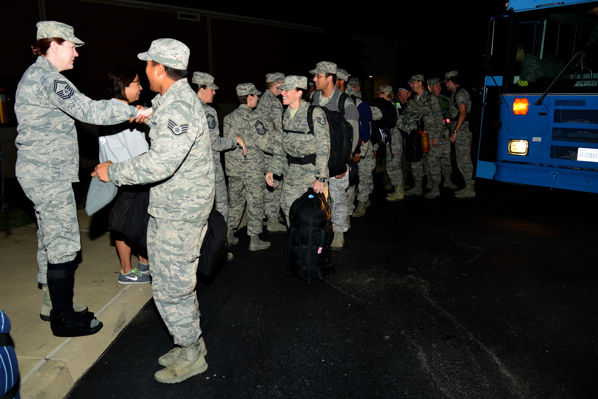 U.S. Air Force Airmen assigned to the 633rd Medical Group are welcomed home at Langley Air Force Base, Va., Oct. 20, 2014. The Airmen deployed to West Africa for nearly one month in support of Operation United Assistance. (U.S. Air Force photo by Senior Airman Aubrey White/Released)