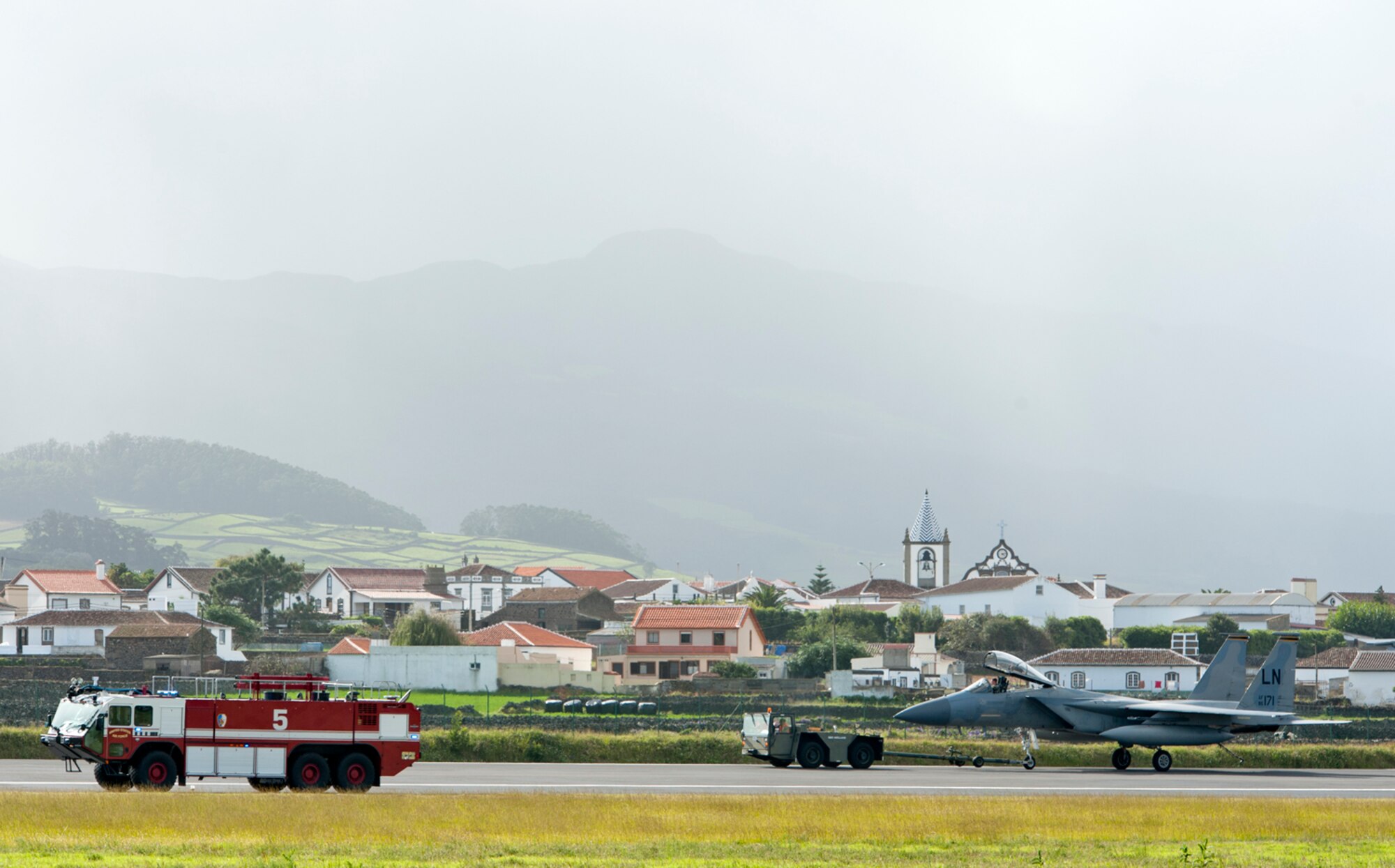 An F-15 Eagle from Royal Air Force Lakenheath, England, is towed off of the flightline after testing and certifying the 65th Air Base Wing’s barrier arresting kit on Lajes Field, Azores, Portugal, Oct. 17, 2014. The barrier arresting kit certification is an annual requirement and is designed to prevent a crash during emergency situations. (U.S. Air Force photo by Tech. Sgt. Bradley C. Church).