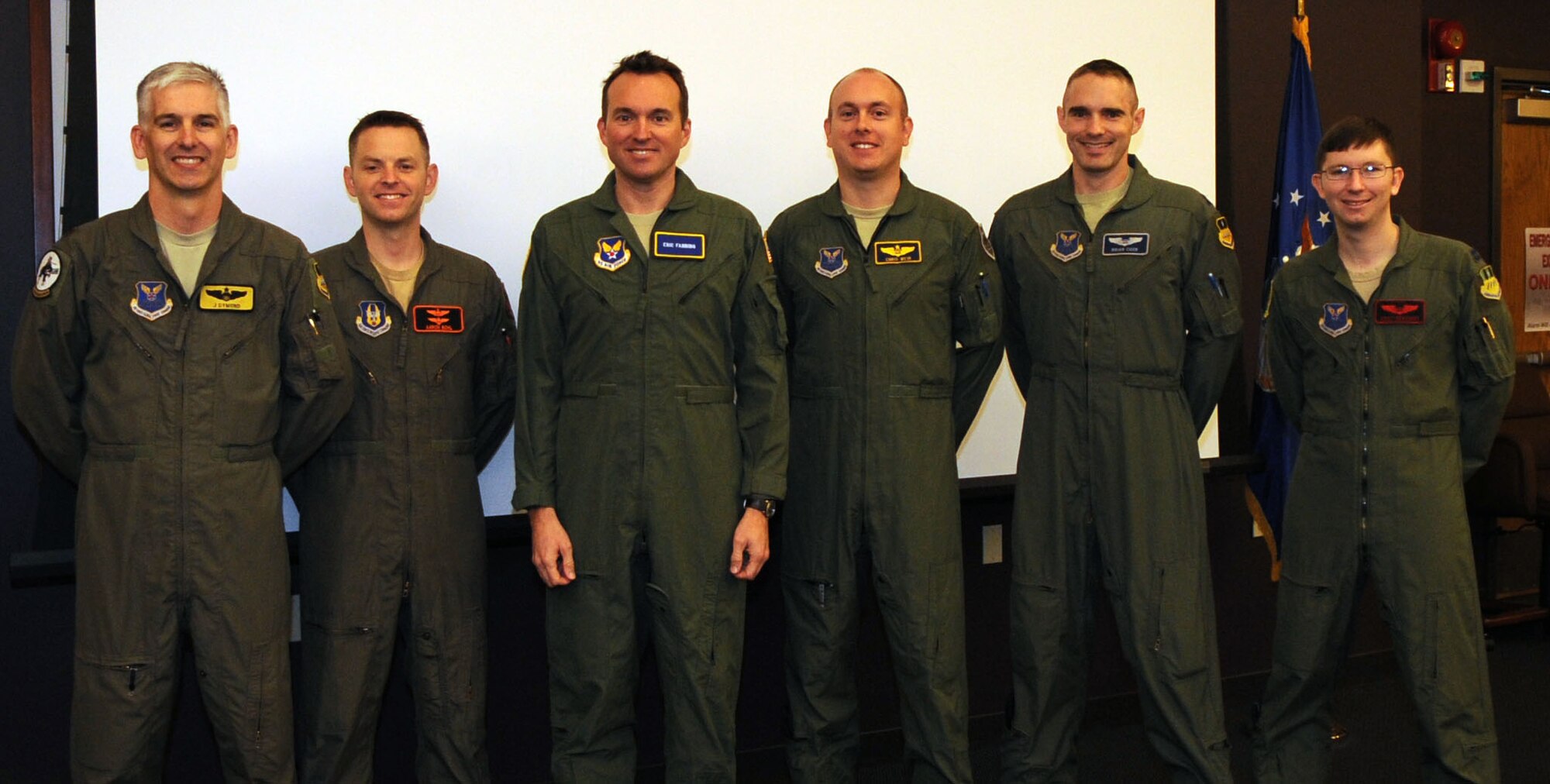Eric Fanning (middle-left), Under Secretary of the Air Force poses with B-52H Stratofortress crew members before receiving a flight brief at Barksdale Air Force Base, La., Oct. 16, 2014. Fanning received the briefing along with flight equipment training before his familiarization flight in the aircraft. (U.S. Air Force photo/Senior Airman Kristin High)