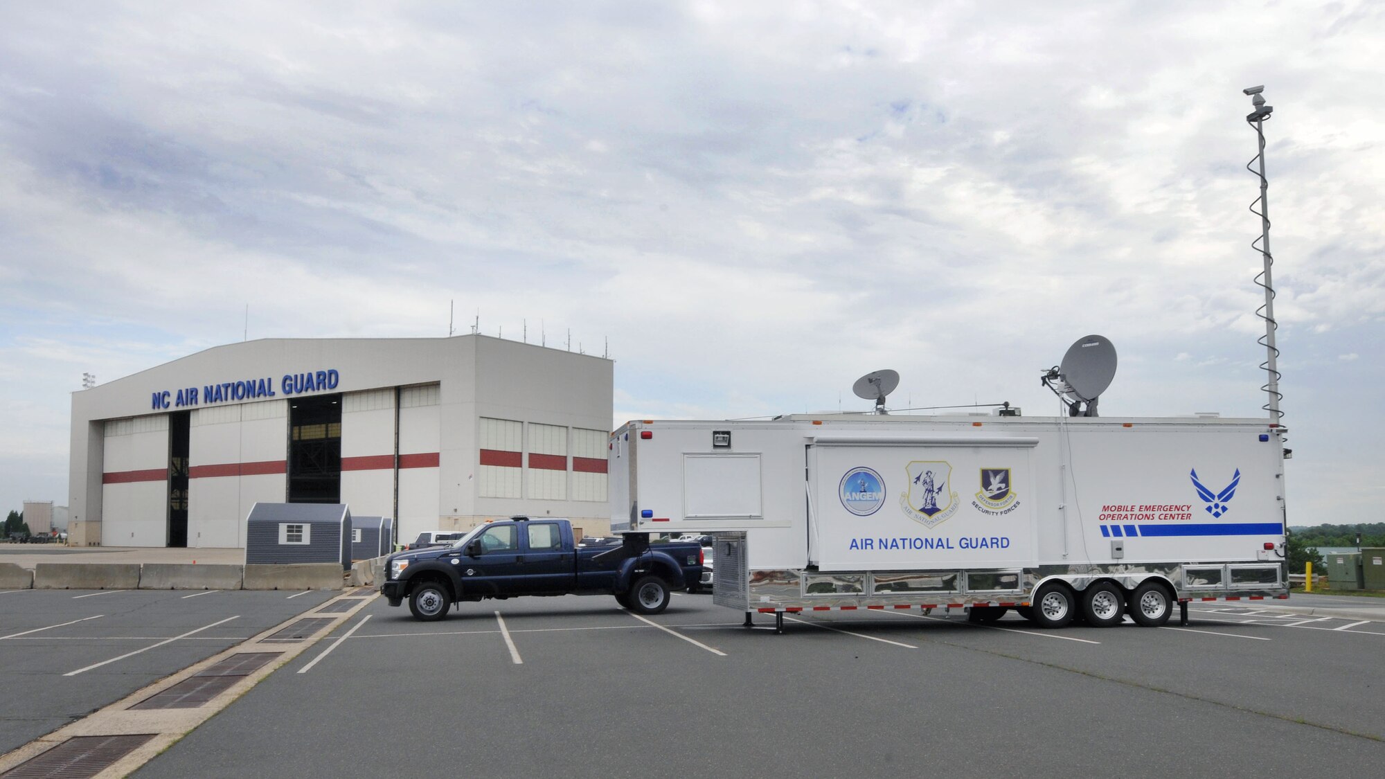 North Carolina Air National Guard has enhanced their ability to work with civilian agencies following a catastrophe, thanks to a new Mobile Emergency Operations Center (MEOC).  Located at the North Carolina Air National Guard base, Charlotte Douglas Intl. Airport, the 36 feet long by 13 feet wide trailer is self-contained, using its own generator capable of supporting 24-hour operations for three to five days. It is specifically designed for use with civilian agencies. Airmen from the 145th Airlift Wing would deploy the MEOC at the request of the civilian community. The civilian emergency management officials could then work out of it side-by-side with our military responders.  (U.S. Air National Guard photo by Master Sgt. Patricia F. Moran, 145th Public Affairs/Released)