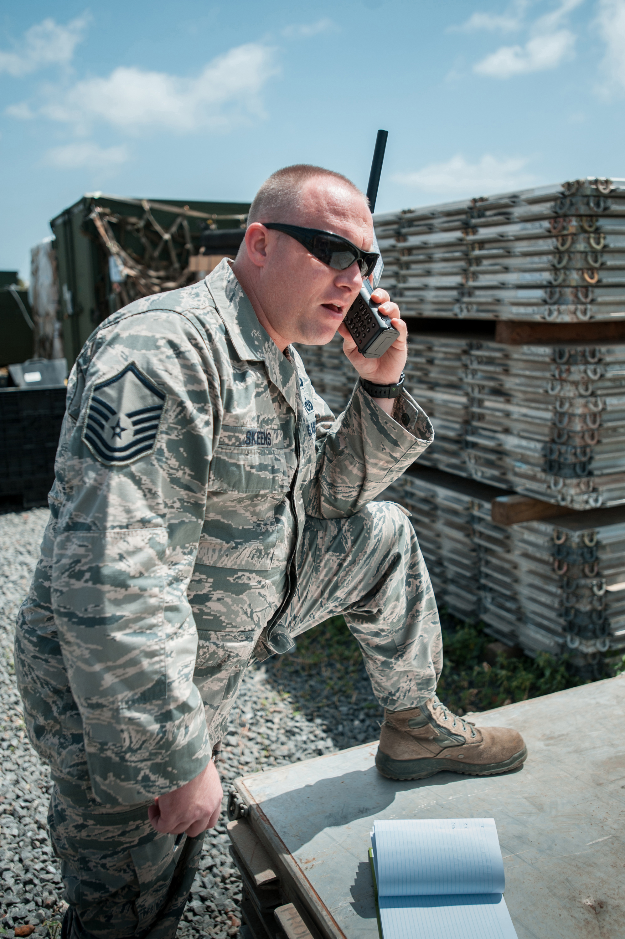 U S Air Force Master Sgt Michael Skeens Uses A Satellite Phone To Coordinate Air Movement At U S Air Force Master Sgt Michael Skeens Uses A Satellite Phone To Coordinate Air Movement At