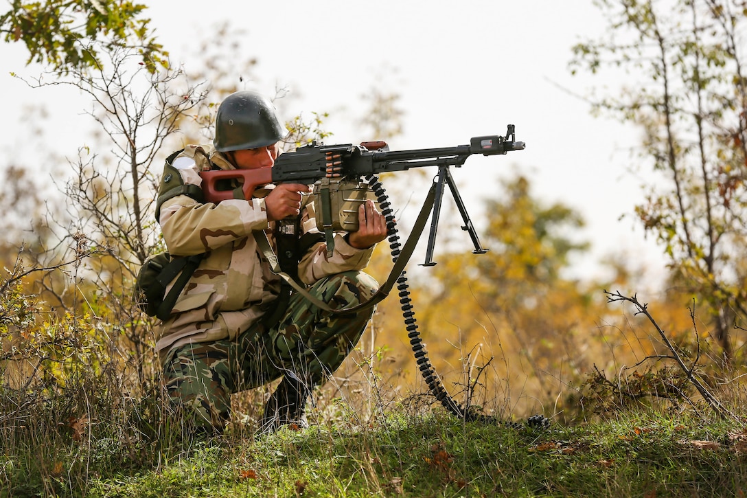 A Bulgarian soldier repels an enemy attack during Exercise Strike Back, Oct. 15 at the Koren Field Training Ground, Bulgaria. Strike Back is a multilateral combat exercise designed to prepare Bulgarian forces to control, command and operate with joint-nation forces. The training consisted of defensive tactics and offensive objectives and maneuvers.