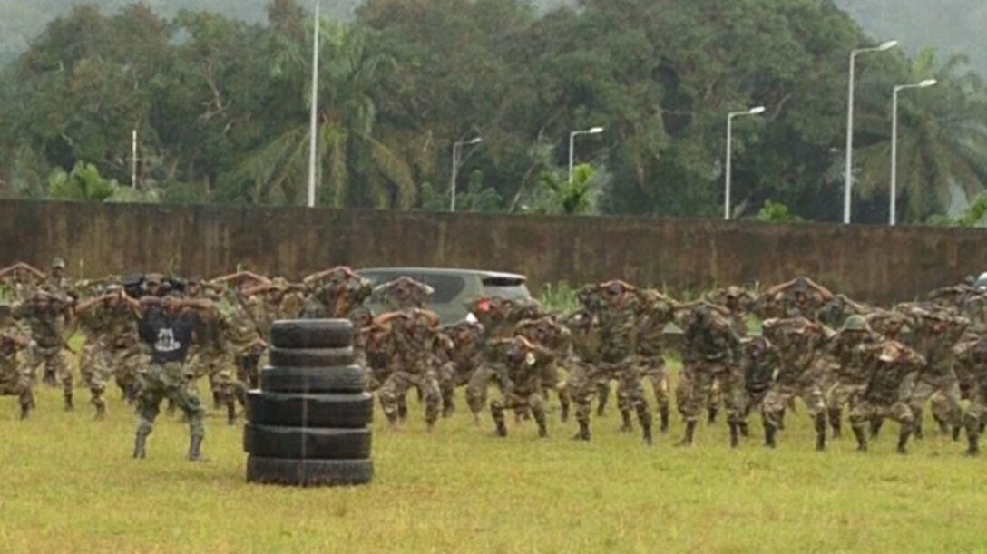 Members of the Cameroonian Naval Commando Company (COPALCO) conduct a physical fitness session, Sept. 28, 2014. Marines with Security Cooperation Team 5B, Special Purpose Marine Air Ground Task Force-Crisis Response-Africa, worked with the COPALCO on marksmanship, boat operations, patrolling and noncommissioned officer leadership. (Courtesy Photo)