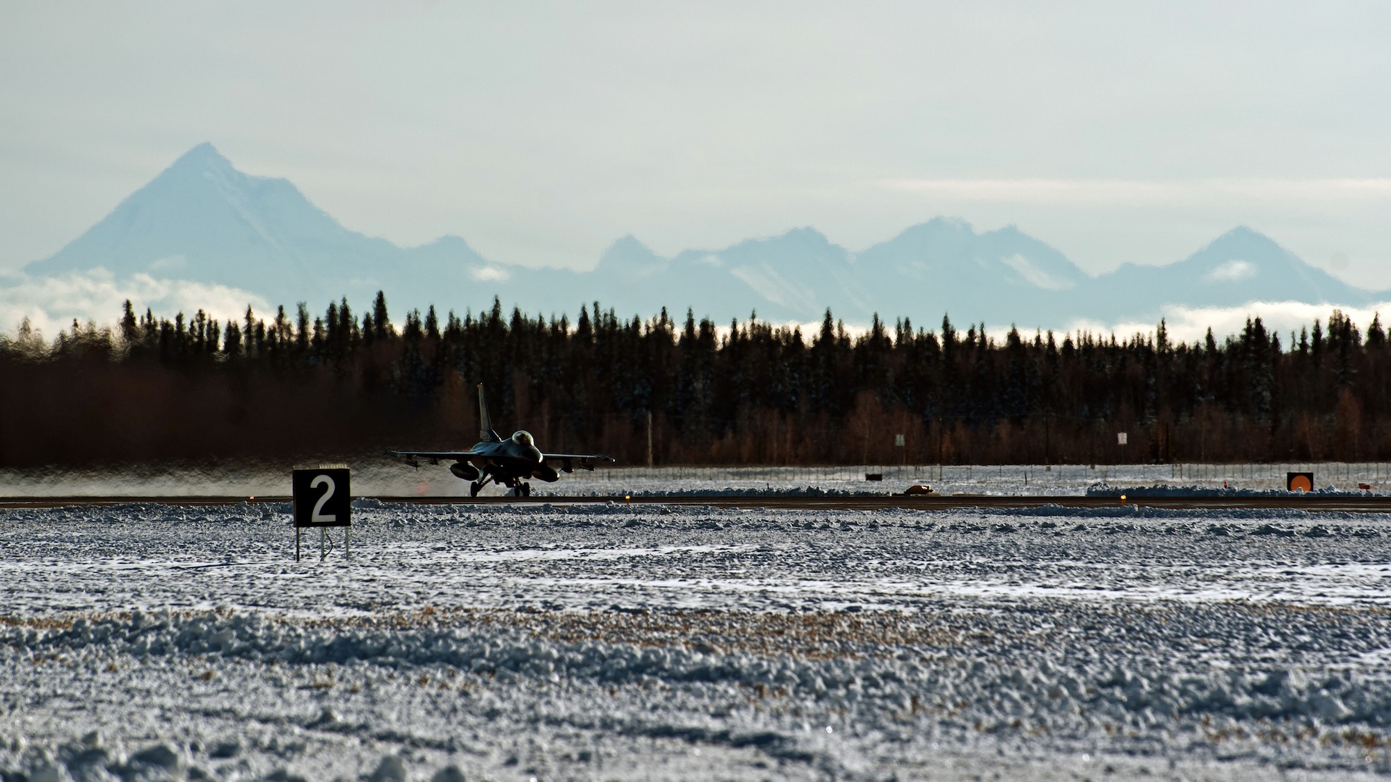 An F-16 Fighting Falcon takes off during Red Flag-Alaska 15-1 Oct. 10, 2014, at Eielson Air Force Base, Alaska. The Pacific Air Forces field training exercise focused on improving combat readiness of U.S. and international forces flown under simulated air combat conditions to prepare for realistic threats. The F-16 is from Kunsan Air Base, South Korea. (U.S. Air Force photo/Senior Airman Taylor Curry)
