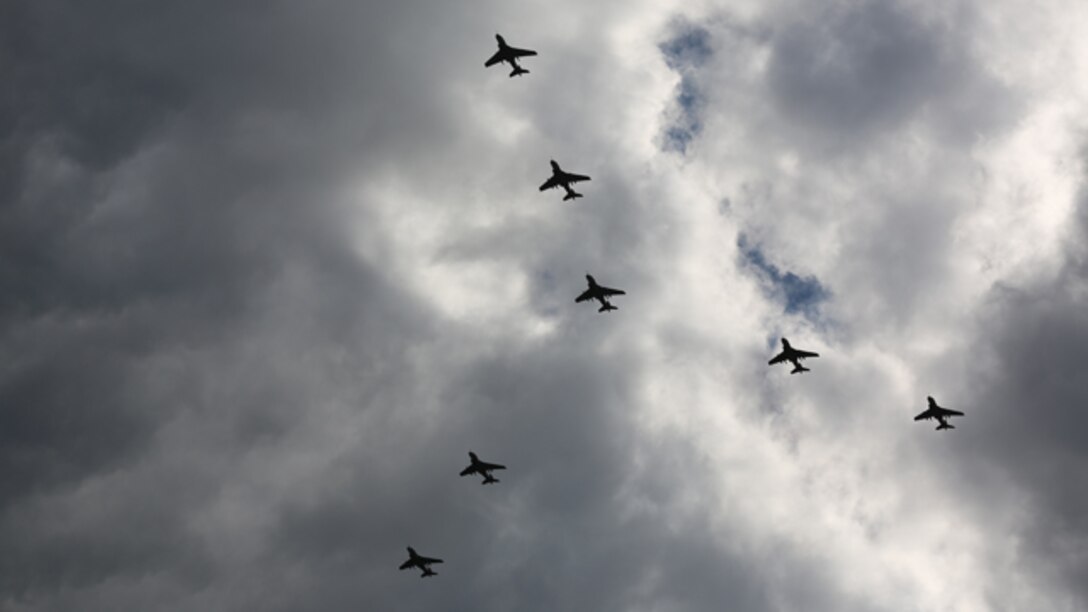Seven EA-6B Prowlers fly in a needle formation over Marine Corps Air Station Cherry Point, N.C., Oct. 16, 2014. The flight was the first in Marine Corps aviation history to have seven Prowlers from the same squadron fly together in formation. The Marines of Marine Tactical Electronic Warfare Training Squadron 1 conducted the fly-bys in celebration of recently being named the recipient of the 2014 Association of Old Crows Marine Corps outstanding unit award.