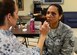 Fake bruises are moulaged on Staff Sgt. Elizabeth Velez as part of the Black Eye Campaign Oct. 3, 2014, at Aviano Air Base, Italy. To help promote Domestic Violence Awareness Month, officers, enlisted, civilian employees and spouses roamed the base with fake bruises to see if fellow Airmen and co-workers would step up and ask them if they are OK. Velez is from the 555th Fighter Squadron. (U.S. Air Force photo/Airman 1st Class Deana Heitzman)