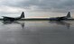 Two C-130 Hercules wait to taxi on the flightline Oct. 20, 2014, during U.S. Air Force Aviation Detachment rotation 15-1, at Powidz Air Base, Poland. The C-130s are assigned to Illinois Air National Guard’s 182nd Airlift Wing. The 182nd AW brought three aircraft to participate in the rotation hosted by the U.S. Aviation Detachment, 52nd Operations Group, at Łask Air Base, Poland. (U.S. Air Force photo/Airman 1st Class Dylan Nuckolls)