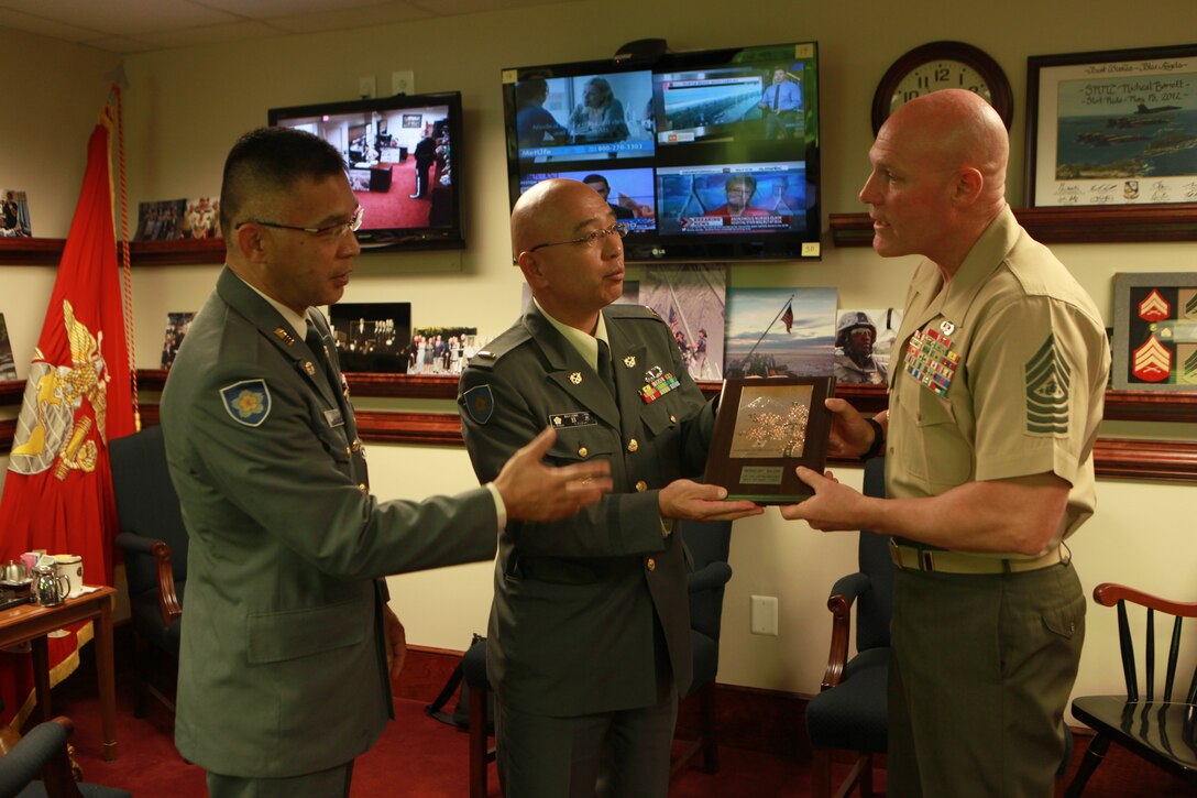 Sgt. Maj. Micheal P. Barrett, the 17th Sergeant Major of the Marine Corps, meets with Warrant Officer Yoshiaki Suzuki, the Sergeant Major of the Japan Ground Self-Defense Force, at the Pentagon in Washington, D.C., on Oct. 15, 2014. (U.S. Marine Corps pho