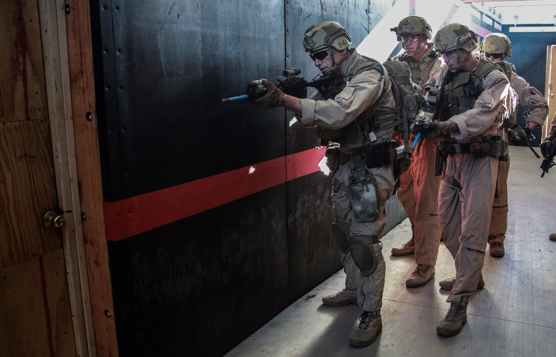 U.S. Marines with Force Reconnaissance Detachment, 15th Marine Expeditionary Unit, prepare to enter a room during a close-quarters tactics course aboard Camp Pendleton, Calif., Oct. 15, 2014. Force Recon Detachment is scheduled to deploy with the 15th MEU next spring. (U.S. Marine photo by Cpl. Steve H. Lopez/Released)