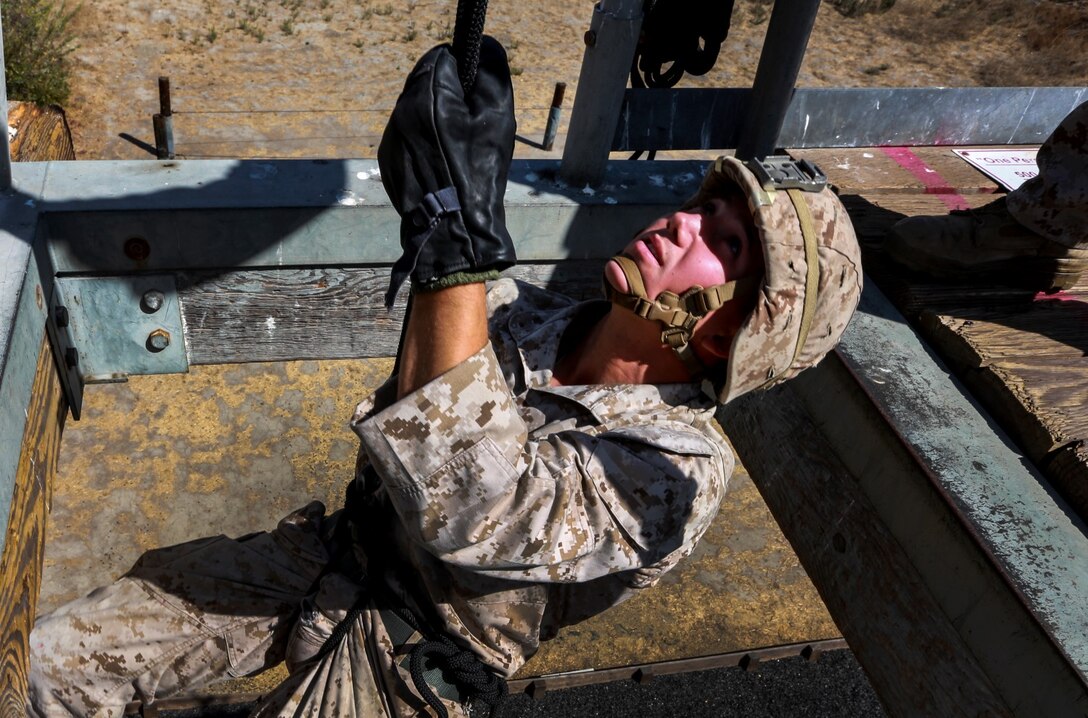 U.S. Marine Cpl. Trevor Hoyt rappels during a helicopter rope-suspension techniques masters course aboard Camp Pendleton, Calif., Oct. 14, 2014. Hoyt is a team leader with Battalion Landing Team, 3rd Battalion, 1st Marines, 15th Marine Expeditionary Unit.  BLT 3/1 is deploying this spring as the 15th MEU’s ground combat element. (U.S. Marine Corps photo by Cpl. Steve H. Lopez/Released)