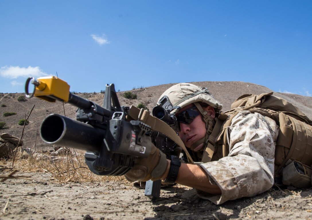 U.S. Marine Lance Cpl. Matthew A. Dailey provides security during a helicopter-raid exercise aboard Camp Pendleton, Calif., Oct. 16, 2014. Dailey is a team leader with Kilo Company, Battalion Landing Team, 3rd Battalion, 1st Marine Regiment, 15th Marine Expeditionary Unit. BLT 3/1 is scheduled to deploy as the 15th MEU’s ground combat element next spring. (U.S. Marine Corps photo by Sgt. Emmanuel Ramos/Released)