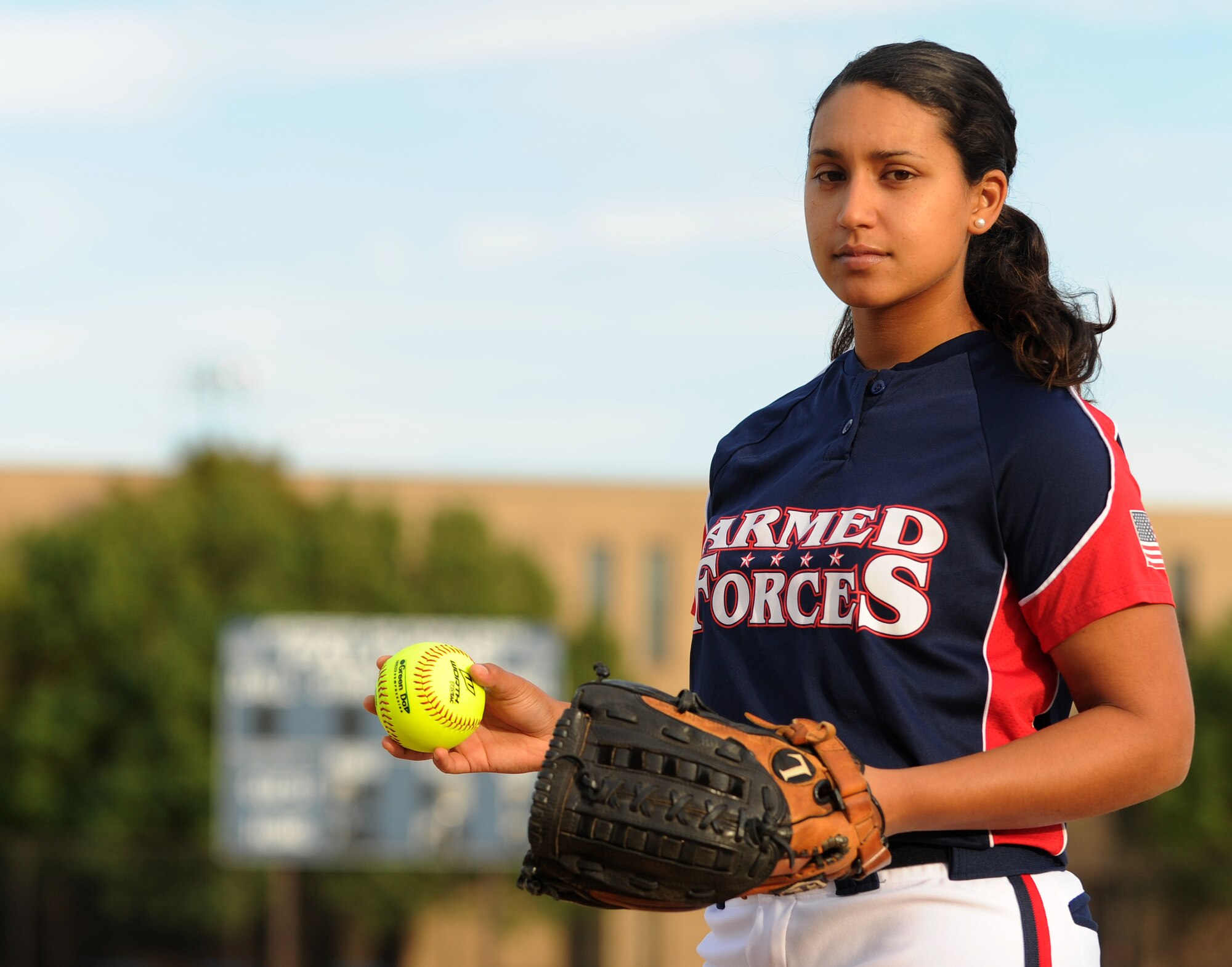 Senior Airman Nesha Humes poses a photo on the softball field at Joint Base Andrews, Md., Oct. 21, 2014. Airman Humes represented the U.S. Air Force as a member of the All-Air Force Women’s and All-Armed Forces Women’s Softball Teams Sept. 14 to 29, 2014. (U.S. Air Force photo/ Staff Sgt. Nichelle Anderson)