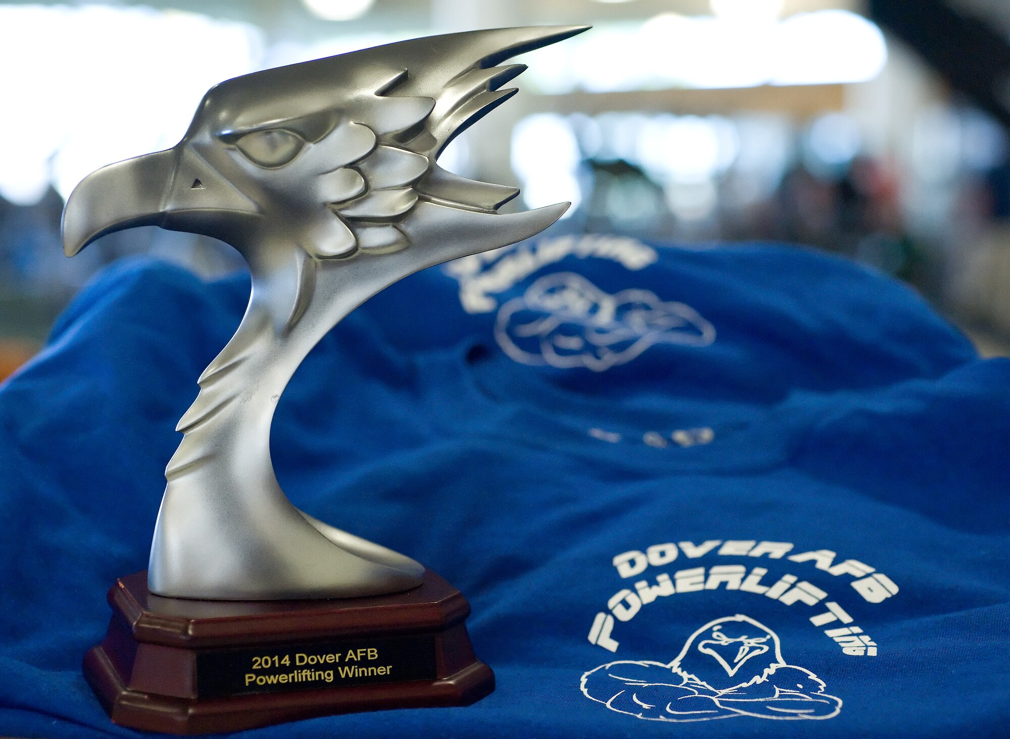 The overall winner in the Dover Air Force Base Powerlifting Competition, John Walters Jr., was awarded this trophy Oct. 17, 2014, at the Fitness Center on Dover AFB, Del. A total of fifteen male and female military and civilian powerlifters competed in the 2014 Dover Air Force Base Powerlifting Competition. (U.S. Air Force photo/Roland Balik)