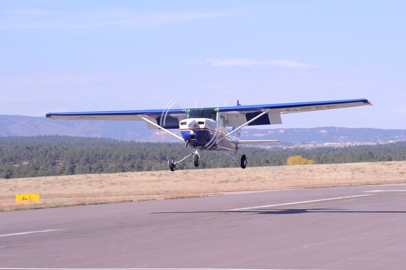 Cadet 2nd Class Brett Meyer prepares to land a Cessna T-51 here during the National Intercollegiate Flying Association Regional Safety and Flight Evaluation Conference Oct. 14. The Academy hosted this year's competition and scored first in overall school rankings, school flight events and school ground events. (U.S. Air Force photo/Bill Evans)  