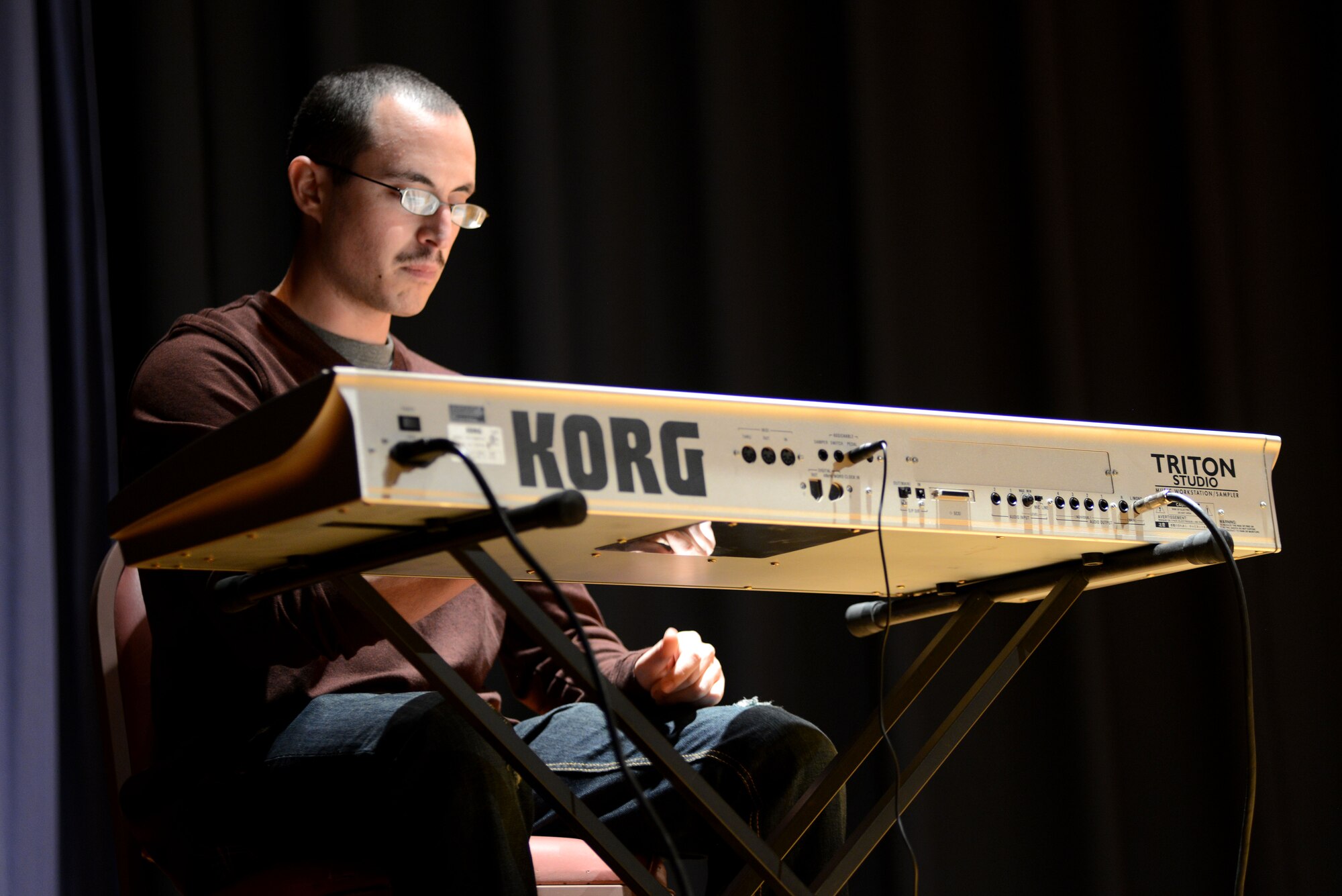 U.S. Air Force Airman 1st Class Gabriel, 45th Intelligence Squadron, plays the piano during Langley’s Got Talent at Langley Air Force Base, Va., Oct. 17, 2014. Each performance was recorded for submission to the worldwide talent search for Tops in Blue, an Air Force variety show. Gabriel was awarded top male instrumentalist. (U.S. Air Force photo by Airman 1st Class Areca T. Wilson/Released) 