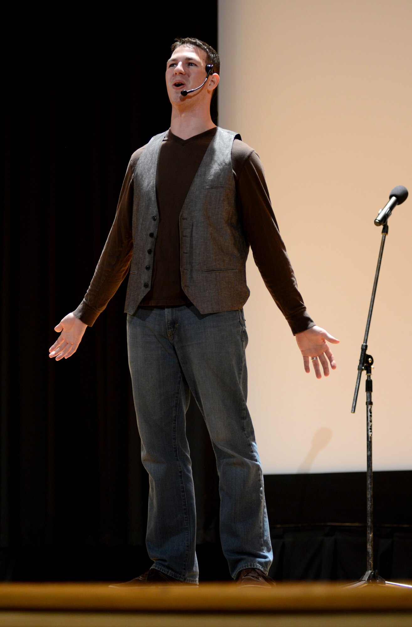 U.S. Air Force Senior Airman Payton, 30th Intelligence Squadron, sings during Langley’s Got Talent at Langley Air Force Base, Va., Oct. 17, 2014. Participants competed for a place in a variety of categories ranging from best performance to most original act. Payton was awarded top male vocalist. (U.S. Air Force photo by Airman 1st Class Areca T. Wilson/Released) 