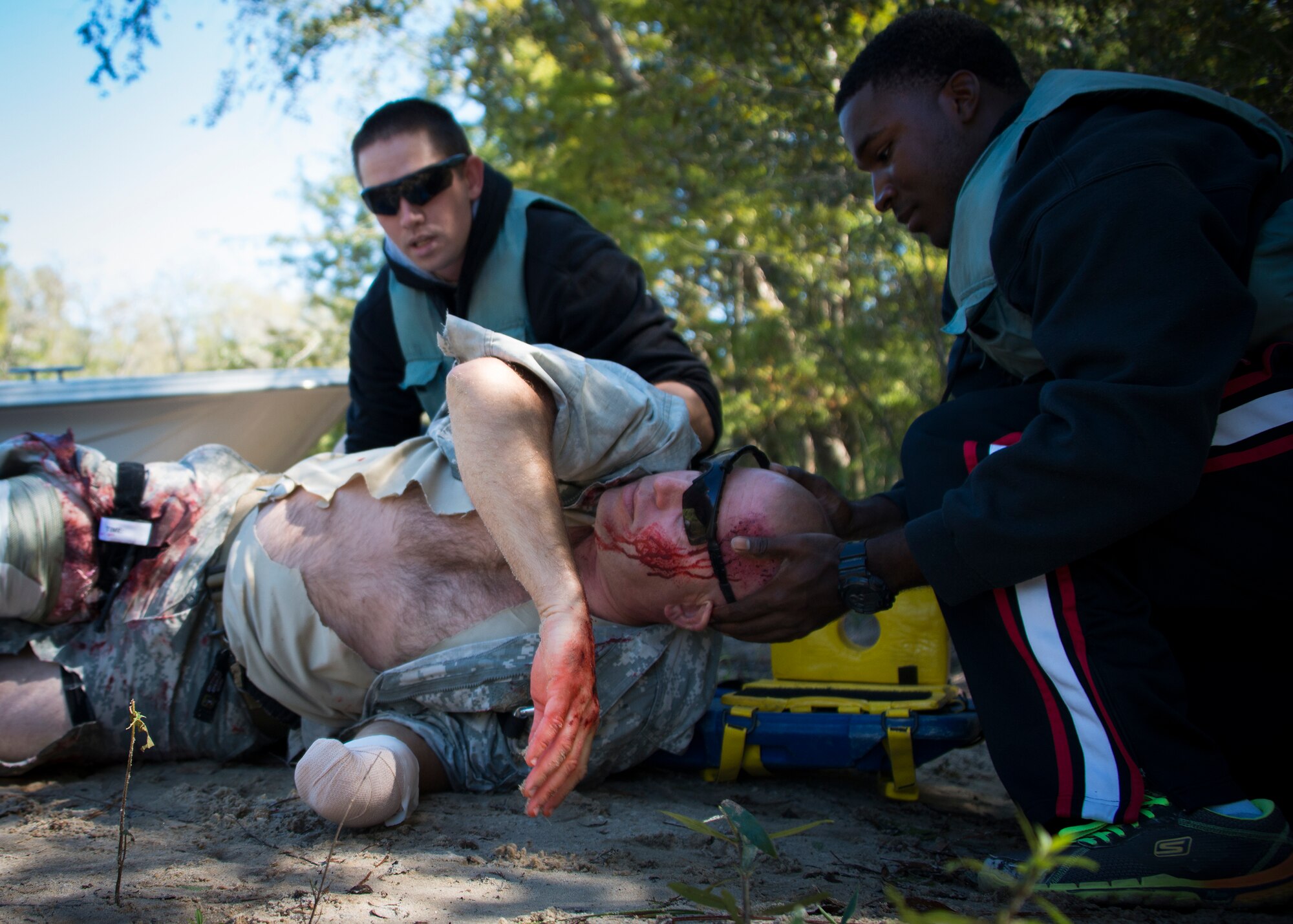 Army medical personnel place a simulated boat crash victim onto a stretcher during the 6th Ranger Training Battalion’s annual major accident response exercise Oct. 16 at Eglin Air Force Base, Fla.  Medics and first responders from the 6th RTB, 96th Test Wing and the local area responded to boating and down aircraft scenarios deep within the Eglin range.  (U.S. Air Force photo/Tech. Sgt. Jasmin Taylor)