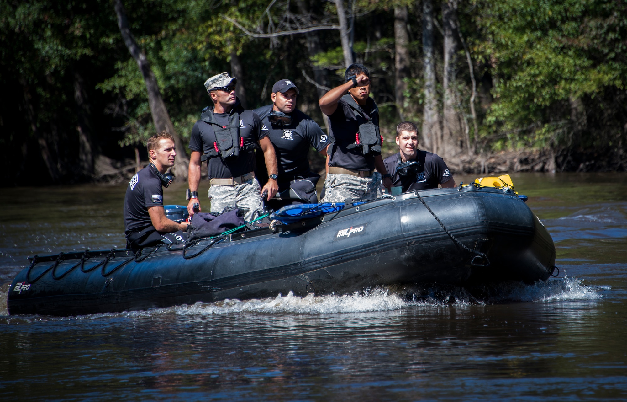 The Ranger dive team arrives at the scene of a simulated boating accident on the Yellow River during the 6th Ranger Training Battalion’s annual major accident response exercise Oct. 16 at Eglin Air Force Base, Fla.  The dive team was tasked to find a missing person who disappeared after the accident.  Medics and first responders from the 6th RTB, 96th Test Wing and the local area responded to boating and down aircraft scenarios deep within the Eglin range.  (U.S. Air Force photo/Tech. Sgt. Jasmin Taylor)