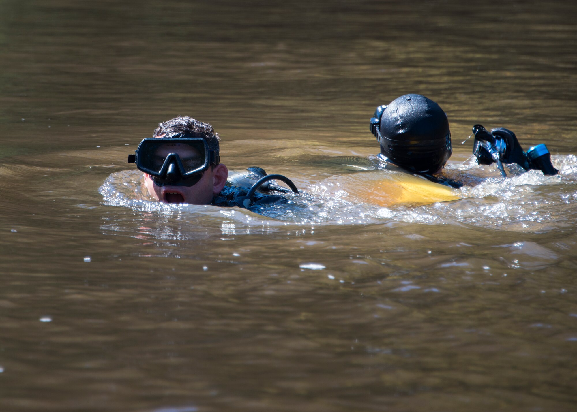 A Ranger diver surfaces after searching the Yellow River for a simulated missing person during the 6th Ranger Training Battalion’s annual major accident response exercise Oct. 16 at Eglin Air Force Base, Fla.  Medics and first responders from the 6th RTB, 96th Test Wing and the local area responded to boating and down aircraft scenarios deep within the Eglin range.  (U.S. Air Force photo/Tech. Sgt. Jasmin Taylor)
