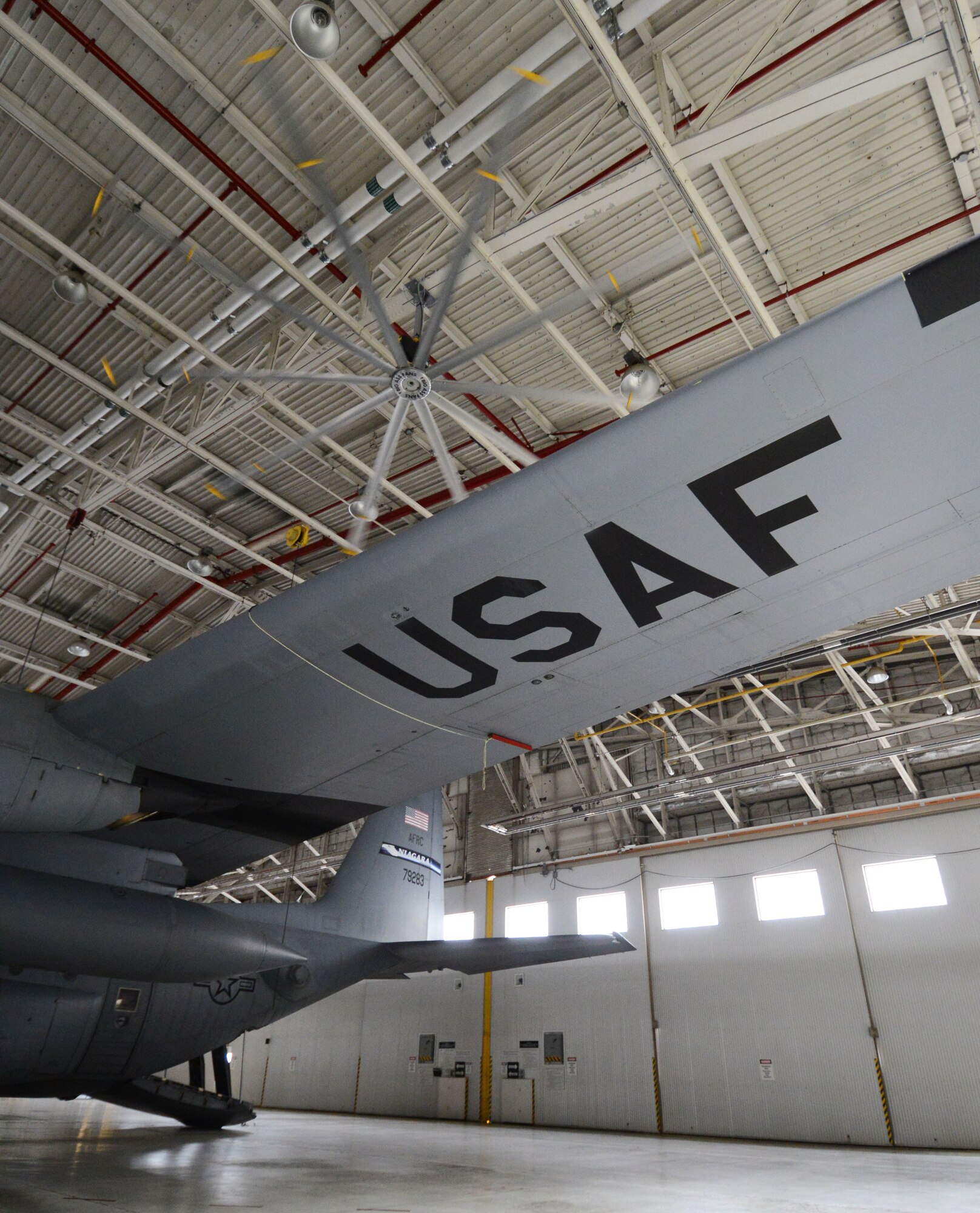 A “Big Ass Fan” controls the temperature of a hangar at the Niagara Falls Air Reserve Station, October 20, 2014. The fan keeps the hangar at a mild temperature year round, saving on the cost of heating and cooling. October is Energy Action Month throughout the federal government and is about creating an Energy Aware Culture, where Airmen are getting personally involved and finding innovative ways to help the Air Force meet our energy goals. (U.S. Air Force photo by Tech. Sgt. Andrew Caya) 