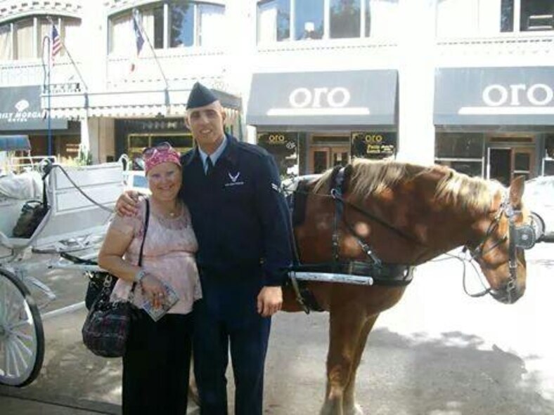 U.S. Air Force Airman 1st Class Joseph Chaney, 23d Force Support Squadron personnelist, and his mother, Lauren Banks, pose for a photo outside of the Alamo in downtown San Antonio. Chaney’s mother passed away from breast cancer after a three-year long fight. (Courtesy Photo)