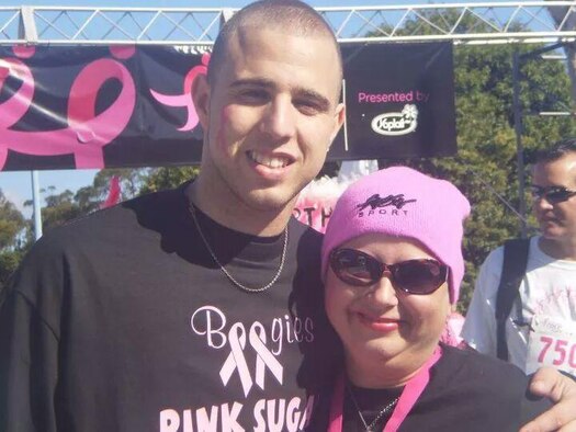 U.S. Air Force Airman 1st Class Joseph Chaney, 23d Force Support Squadron personnelist, and his mother, Lauren Banks, pose for a photo during a breast cancer walk in San Diego. Chaney accompanied his mother to numerous breast cancer walks and he considered himself her No. 1 cheerleader. (Courtesy Photo)