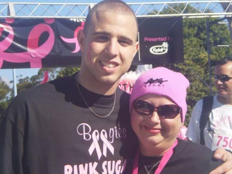 U.S. Air Force Airman 1st Class Joseph Chaney, 23d Force Support Squadron personnelist, and his mother, Lauren Banks, pose for a photo during a breast cancer walk in San Diego. Chaney accompanied his mother to numerous breast cancer walks and he considered himself her No. 1 cheerleader. (Courtesy Photo)