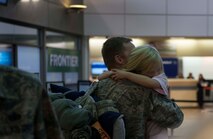 Deployers from the North Dakota Air National Guard’s 219th Security Forces Squadron are welcomed home at the Minot International Airport, Oct. 15. 2014. The Airmen returned from a six-month deployment from Southwest Asia where they provided support to the U.S. Central Command. (U.S. Air Force photo/Airman 1st Class Lauren Pitts) 