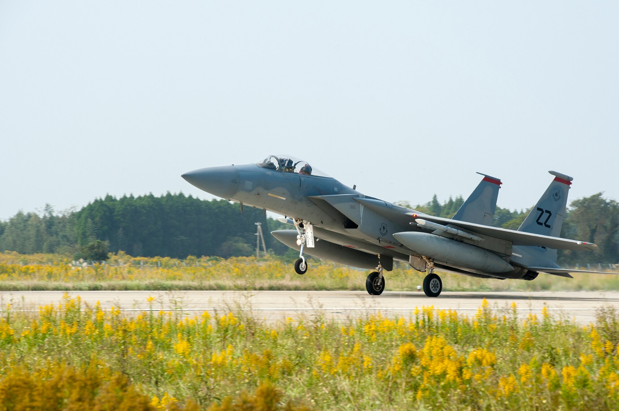 A U.S. Air Force F-15 Eagle touches down on Nyutabaru Air Base, Japan, Oct. 18, 2014. Twelve F-15s arrived from Kadena Air Base, Japan, to participate in a two week-long Aviation Training Relocation Program. (U.S. Air Force photo by Senior Airman Marcus Morris/Released)