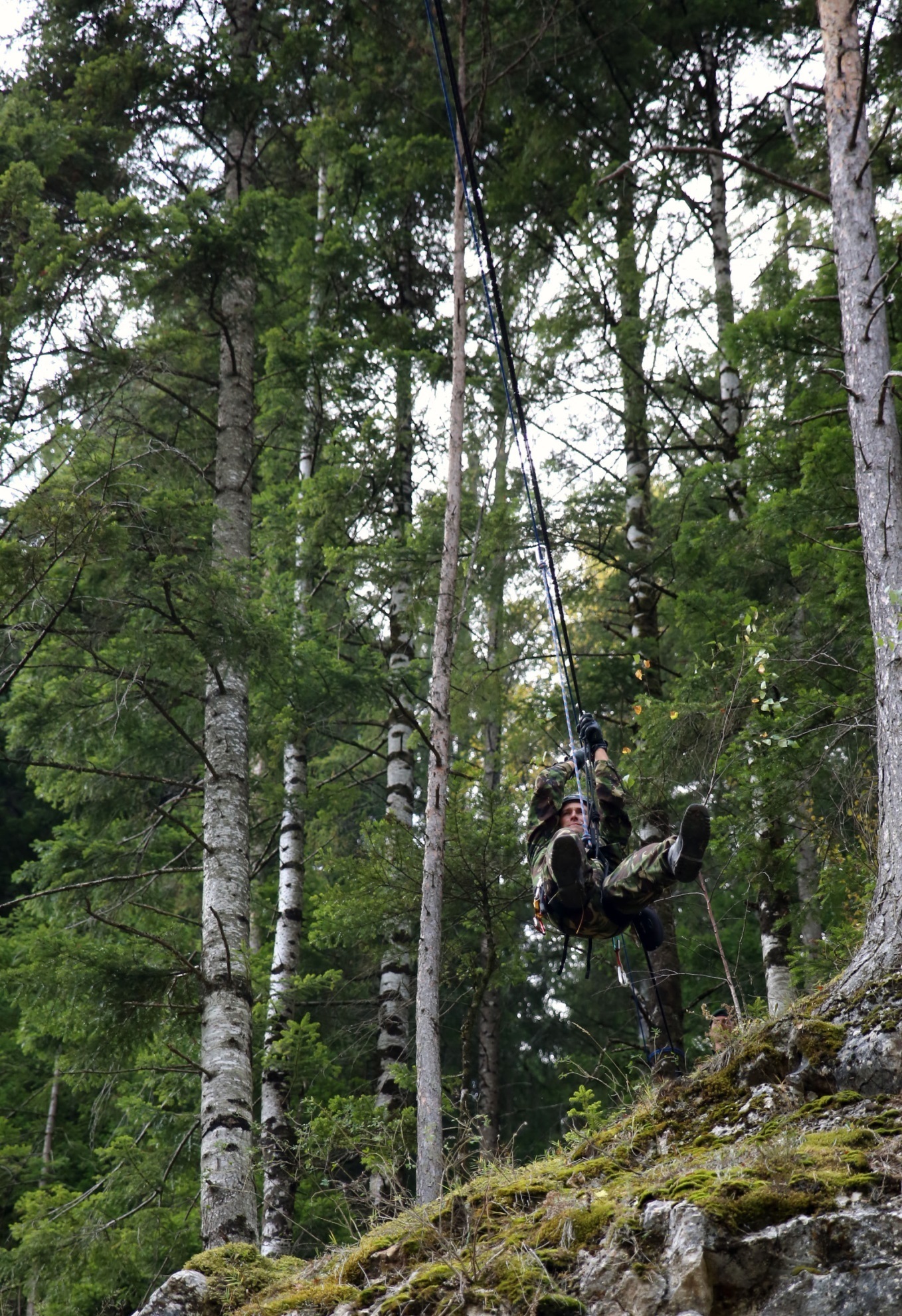 U.S. Marines and sailors from Black sea Rotational Force 14 participated in Platinum Lynx 14.6 in the Carpathian Mountains from Sept. 29 to Oct. 3 in Miercurea Ciuc, Romania. Knowledge and understanding of skills and tactics in mountain regions was shared between the Marines and Romanian Land Forces to help sustain readiness in any location. Service members trained with the 61st Mountain Troops Brigade from the Romanian Land Forces in rappelling, rock climbing, a live-fire range and survival skills. The exercise concluded with a 15-kilometer troop movement in high-elevation terrain. (U.S. Marine Corps photo by Lance Cpl. Ryan Young/released)