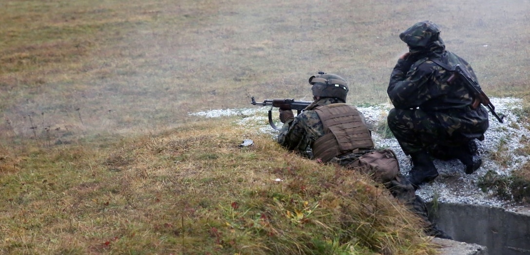 U.S. Marines and sailors from Black sea Rotational Force 14 participated in Platinum Lynx 14.6 in the Carpathian Mountains from Sept. 29 to Oct. 3 in Miercurea Ciuc, Romania. Knowledge and understanding of skills and tactics in mountain regions was shared between the Marines and Romanian Land Forces to help sustain readiness in any location. Service members trained with the 61st Mountain Troops Brigade from the Romanian Land Forces in rappelling, rock climbing, a live-fire range and survival skills. The exercise concluded with a 15-kilometer troop movement in high-elevation terrain. (U.S. Marine Corps photo by Lance Cpl. Ryan Young/released)